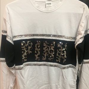 Pink long sleeve sparkle tee.
